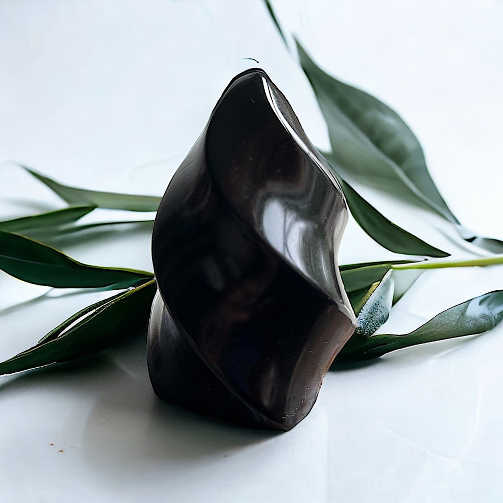 Polished Black Obsidian Flame Carving